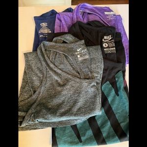 Running tank tops, lot of 4! Very nice! Downsizing! Smoke free home!